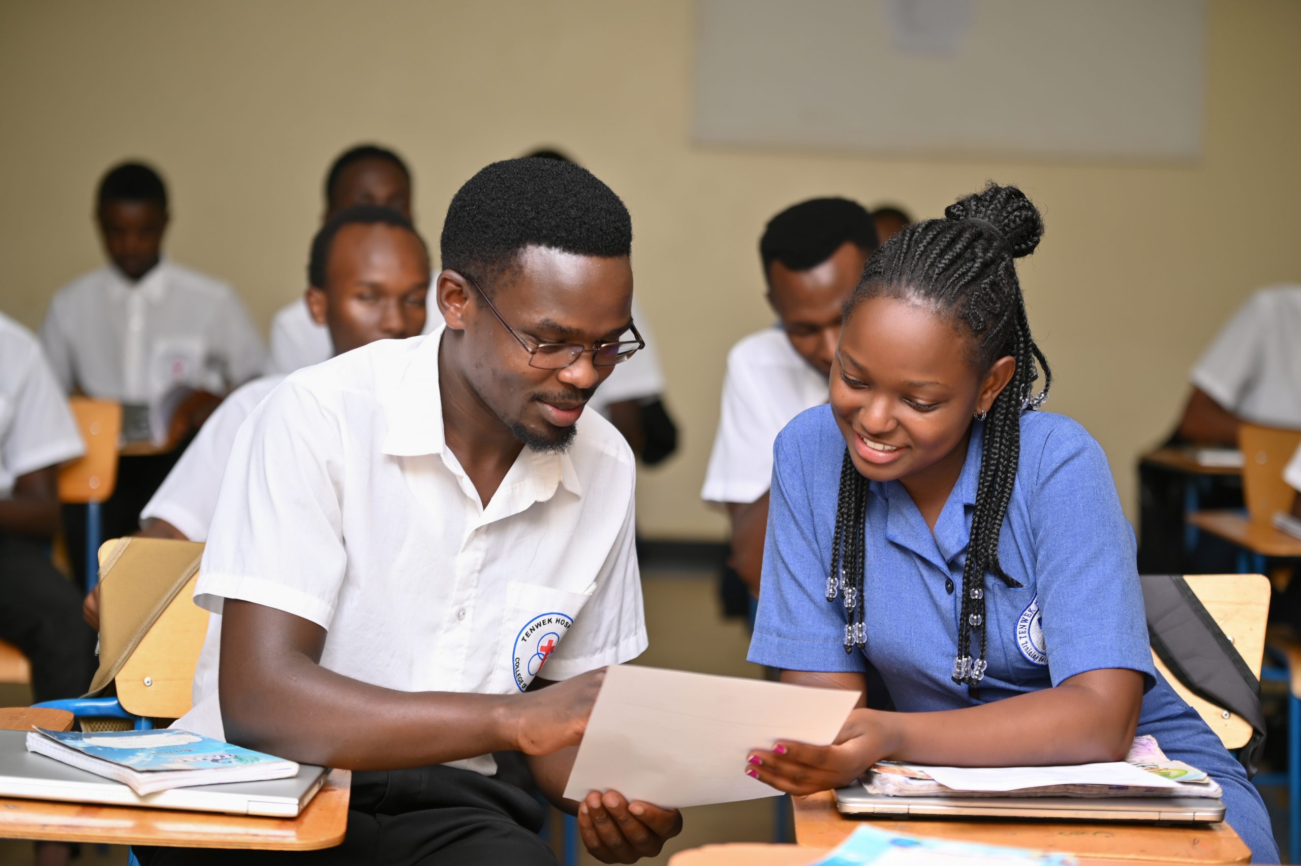 Students of the College of Health Sciences talking together outside on campus